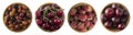 Dark red berries on a white background. Cherries, gooseberries, rasberries and plums in a wooden bowl.