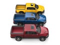 Dark red, blue and yellow modern pick-up trucks - top down side view Royalty Free Stock Photo