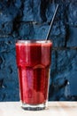 Dark red or Burgundy fruit and berry smoothie in a large glass Royalty Free Stock Photo