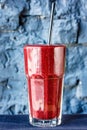 Dark red or Burgundy fruit and berry smoothie in a large glass Royalty Free Stock Photo