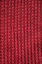 Dark red knitted material texture background. Top view. Copy, empty space for text Royalty Free Stock Photo