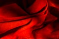 Dark red matte background of suede fabric, closeup. Velvet texture of seamless wine leather. Felt material macro. Red Royalty Free Stock Photo