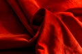 Dark red matte background of suede fabric, closeup. Velvet texture of seamless wine leather. Felt material macro. Red Royalty Free Stock Photo