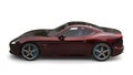 Dark red metallic fast sports car - side view Royalty Free Stock Photo