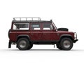 Dark red off road 4WD car - side view Royalty Free Stock Photo