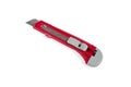 Red office stationery cutter knife on a white background