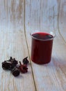 dark red-purple coloured juice. The Burkinabes, Senegalese, and Ivorians call it bissap Royalty Free Stock Photo