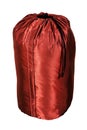 Dark red shiny tourist sleeping bag, isolated on white background, designed for hiking tours and tents