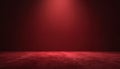 Dark red studio background with textured floor. Top spotlight illuminates empty stage. Rich crimson wall creates elegant backdrop Royalty Free Stock Photo