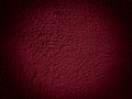 Dark red to black gradient with wall texture.