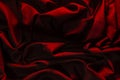 Dark red wrinkled fabric, With lights falling into patterns