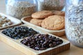 Coffee beans, green tea and biscuits for breakfast Royalty Free Stock Photo