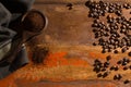 Dark roasted pure arabica coffee beans and ground coffe on the w Royalty Free Stock Photo