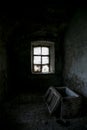 Dark room of abandoned mansion. Opened old chest Royalty Free Stock Photo