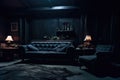 A dark room with black furniture and dim light.