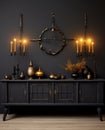 a dark room with candles and a black buffet table