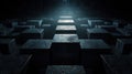 A dark room with a series of black cubes arranged in a pattern, leading to a bright light at the top. Royalty Free Stock Photo