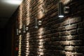 Dark room shined brick wall Royalty Free Stock Photo