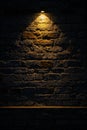 Dark room wall with ceiling light background. Old, weathered grey brick stone wall. Low key, scary, moody space. Room in basement Royalty Free Stock Photo