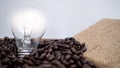 Dark rose coffee bean, Black coffee cup on old wooden table top view