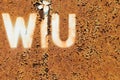 Dark Rusted Metal Texture Background with WIU Letters