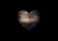 a dark rusty iron heart