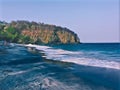 Dark sand beach and seaside with distant mountain? digital illustration Royalty Free Stock Photo