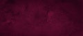 Dark saturated burgundy watercolor background with torn strokes and uneven spots. Trend color texture. Abstract background Royalty Free Stock Photo