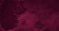 Dark saturated burgundy watercolor background with torn strokes and uneven spots. Trend color texture. Abstract background Royalty Free Stock Photo