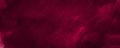 Dark saturated burgundy watercolor background with torn strokes and uneven spots. Trendy color texture. Royalty Free Stock Photo