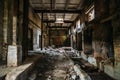 Dark scary corridor in abandoned industrial ruined brick factory, creepy interior, perspective Royalty Free Stock Photo