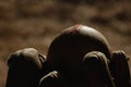 Dark scene of used baseball in glove closeup Royalty Free Stock Photo