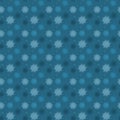 Dark seamless pattern of many light snowflakes on blue background. Soft Christmas winter theme for gift wrapping. New Year