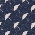 Dark season seamless pattern with doodle umbrella shapes. Navy blue background with dots. Grey colored accessory