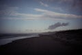Dark shot of an empty beach in Germany under a cloudy sky Royalty Free Stock Photo
