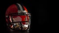 High contrast lighting on american football helmet illuminated by dramatic hard light