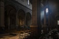 The dark and silent interior of an ancient church