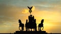 The famous Dark silhouette impression at sunset of the Quadriga of the Brandenburg Gate in Berlin, Germany