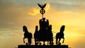 The famous Dark silhouette impression at sunset of the Quadriga of the Brandenburg Gate in Berlin, Germany