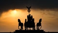 Dark silhouette impression at sunset of the Quadriga of the Brandenburg Gate in Berlin, Germany