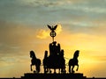 Dark silhouette impression at sunset of the Quadriga of the Brandenburg Gate in Berlin, Germany