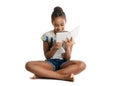Dark-skinned teen girl reading e-book
