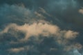 The dark sky with black clouds covered before the big storm will enter. The big powerful storm clouds before a thunder-storm