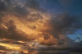Dark sky with blak clouds brings storm rain at the sunset Royalty Free Stock Photo