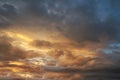 Dark sky with blak clouds brings storm rain at the sunset Royalty Free Stock Photo