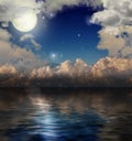 Yellow moon and dark clouds with reflection Royalty Free Stock Photo