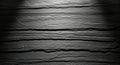 Dark slate texture background with dramatic spotlight showing black stone surface with horizontal layers for luxury banner design Royalty Free Stock Photo