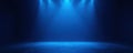 Dark stage bathed in single vibrant blue spotlight, concert, image Royalty Free Stock Photo