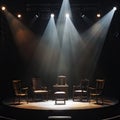 Dark Stage with Shining Spotlights and Different Chairs, Theater Performance, Empty Seats on Stage Royalty Free Stock Photo