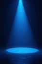 Dark stage, single vibrant blue spotlight on center, , emptystage, abstract Royalty Free Stock Photo